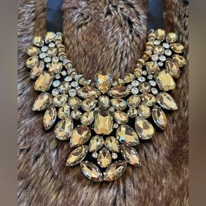 Statement Necklace- Large gold and clear rhinestones. Ribbon tie